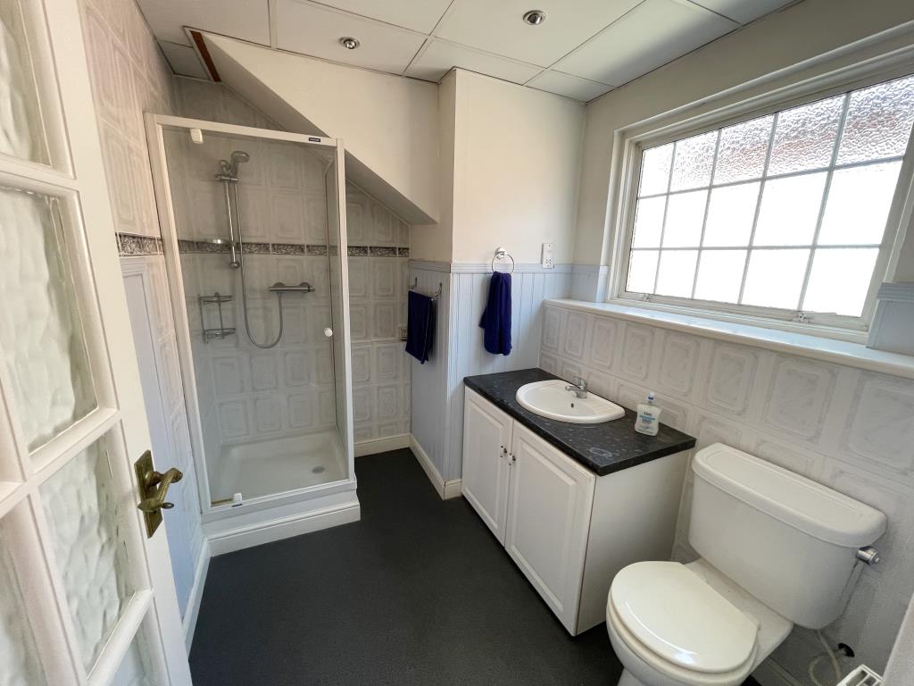 Lot: 84 - DETACHED BUNGALOW & GARAGE WITH POTENTIAL - inside image of first floor shower room from landing